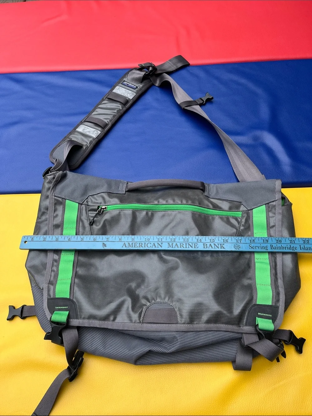 Patagonia’s Gray Messenger Bag with Green Accents older black hole
